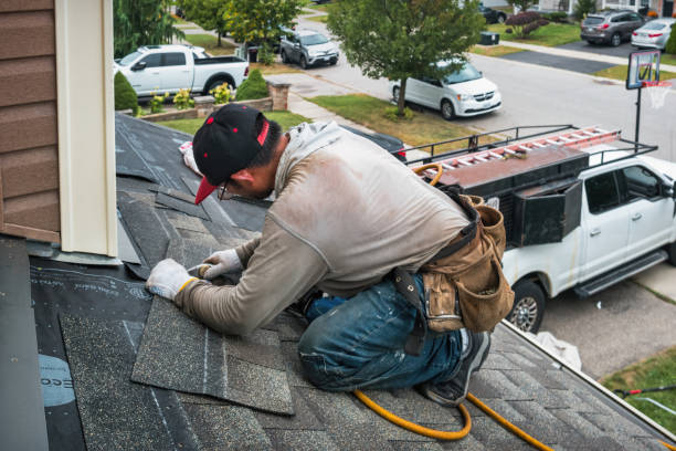 Professional Roofing technician working in Zieglerville, PA
